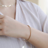 The Adeline Twisted Bangle